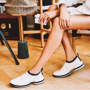 Stuart Weitzman White and Black Slip-On Sneakers. Size: 9½.